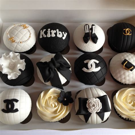 Matching Chanel themed cupcakes . 